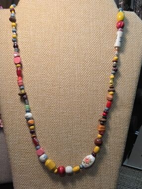 Handcrafted Multicolor Beaded Necklace with Floral Accent